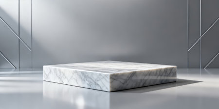 3d rendering of a white marble podium on a gray background.の素材