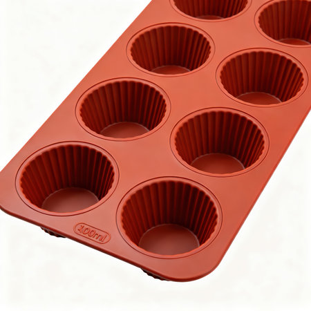 3D render of a baking tray with muffins on a white backgroundの素材