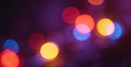 Colorful bokeh lights on black background. Christmas background.の素材