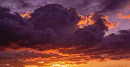 Colorful dramatic sky with clouds at sunset.Sky background.Sky with clouds at sunset.の素材