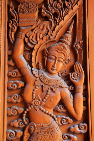 Thai goddess at the window of temple in Thailandの写真素材