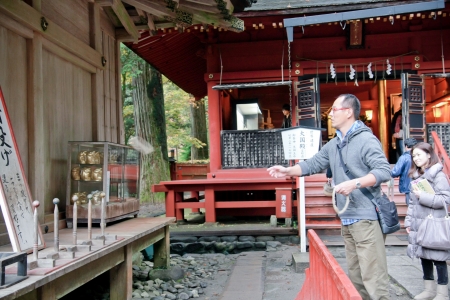 NIKKO, JAPAN - NOVEMBER 6 Japanese playing the activity for the fortune at A shinto shrine at Nikko on November , 2011 in Nikko, JAPANのeditorial素材