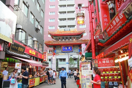 KOBE, JAPAN - August 14: Walking street market at China Town in Kobe, Japan on August 14, 2011. The famous place for eating and shopping of the tourist.のeditorial素材