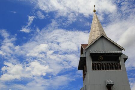 Local belfry with blue sky in the rural of Thailandの写真素材