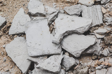 Cracked cement sheet on the construction site