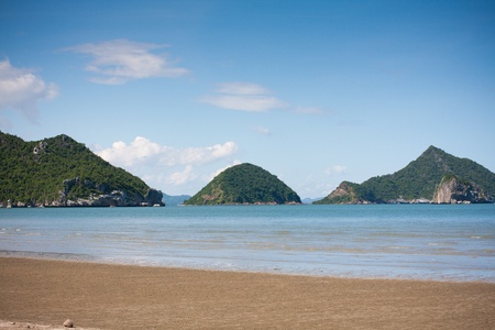 Beauty beach with the mountain and blue sky in Thailandの写真素材