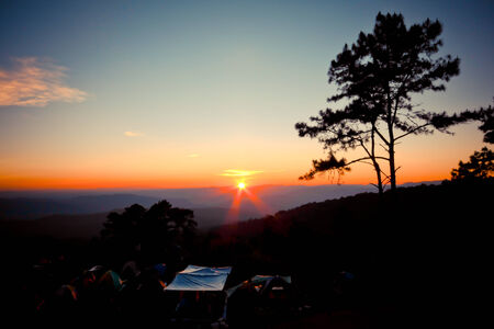 Mist and sunrise at the mountain in the northern of Thailandの写真素材