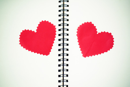 Notebook with heart  Send message to your lover in Valentineの写真素材