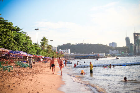PATTAYA, THAILAND - April 26  People walking along the beach on April 26, 2014 in Pattaya, Thailand のeditorial素材