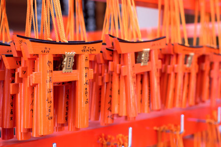 Small praying torii cards at the Fushimi Inari Shrine in Kyoto, Japan
