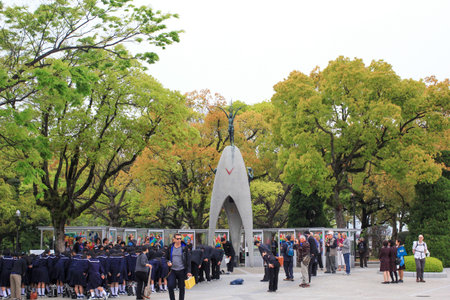 HIROSHIMA, JAPAN - April 16: Japanese students are visiting at Sadako statue in Hiroshima Peace Park on April 16, 2014 in Hiroshima, Japan.のeditorial素材