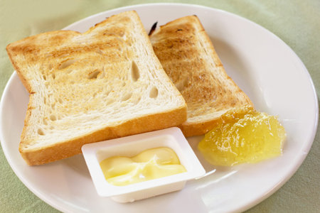 Bread, butter and jam for breakfast