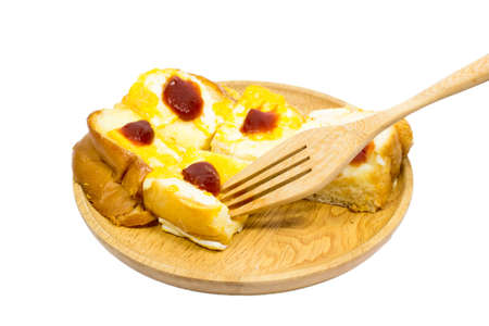 Slice toast bread with topping egg and tomato sauceの写真素材