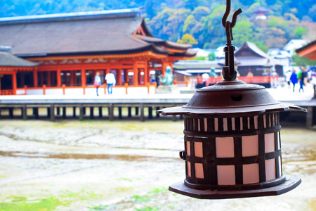 Ancient lamp at Itsukusima shrine miyajima island in Hiroshima, Japanのeditorial素材