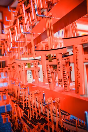 KYOTO, JAPAN - April 15: Small praying torii cards at the Fushimi Inari Shrine on April 15, 2014 in Kyoto, JAPAN. in Kyoto, Japanのeditorial素材
