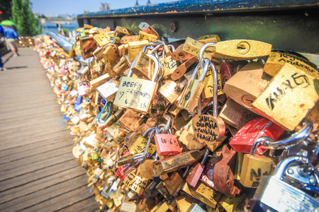 Paris, France-July 4: Close up of the padlocks on the Pont de l'Archeveche Archbishop's Bridge in Paris, France, July 2015のeditorial素材