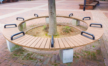 Wooden modern trendy design round circular park benchの写真素材