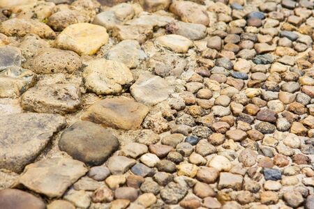 Rounded rock floor textureの写真素材