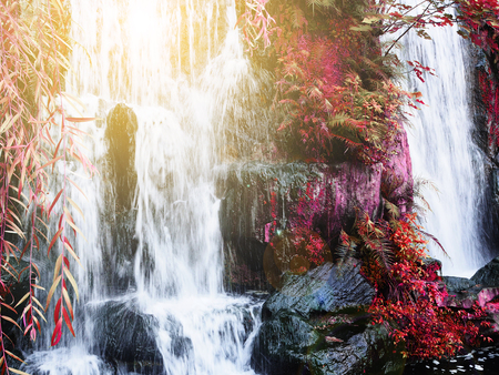 Abstract waterfall natural background in autumn color toneの写真素材