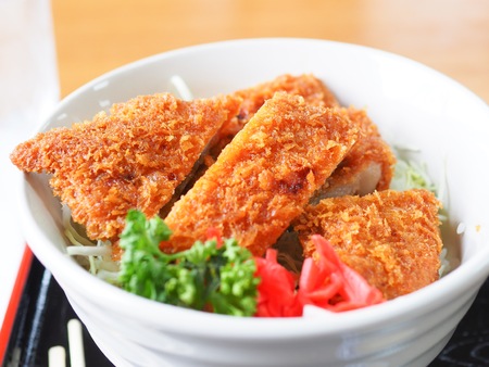 Fried cattle pork on rice bowl, Japanese food in the restaurantの写真素材