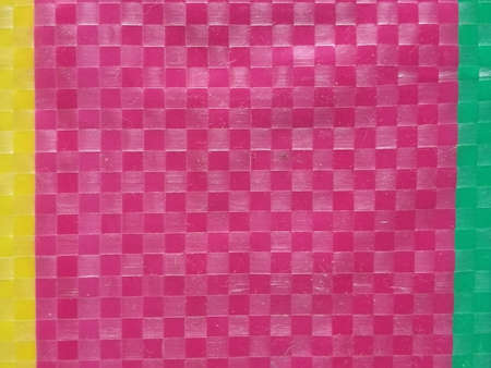 Blur Sack color stripe background surface, summer color layer, color chessboard grid, yellow pink and green, majority pink in middle yellow and gren at sideの写真素材