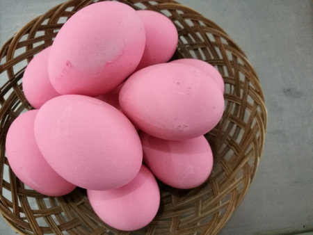 Dozen of Century egg, preserved egg, chicken or duck egg for cooking breakfast in bucket with blur background, Easter egg for hidingの写真素材