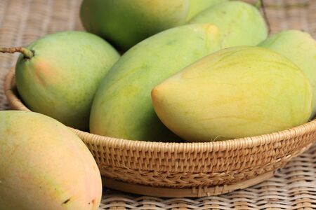 Mango fruit name nam-dhog-mai in basket の写真素材