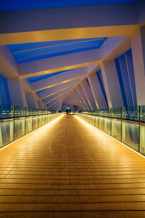 Dubai, United Arab Emirates - February 7, 2021: Amazing Futuristic twisted or spiral Bridge through Dubai Water Canal.のeditorial素材