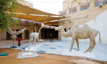 Dubai, UAE, 26 May 2021: Al Seef district in Dubai in the evening. Creek Bur Dubai is a place of Old Traditional Emirati Architectural Building Houses Shops or Souqのeditorial素材