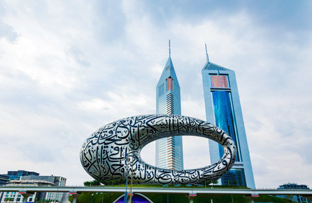 Dubai, UAE, 4 January 2022: Beautiful view of Emirates Towers and Museum of Future Dubai on a cloudy...