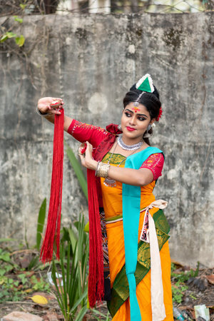 Students are celebrating Holi or 'Basanta Utsav' at Rabindra Bharati University campus in Kolkata,...