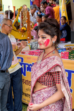 Women participate in Sindur Khela at a puja pandal on the last day of Durga puja at Baghbazar...