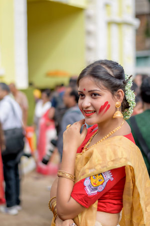 Women participate in Sindur Khela at a puja pandal on the last day of Durga puja at Baghbazar...