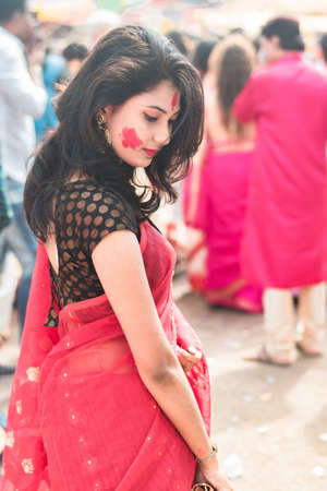 Kolkata, India â 8th October 2019; Women participate in Sindur Khela at a puja pandal on the last day of Durga puja at Baghbazar Sarbojanin in Kolkataのeditorial素材