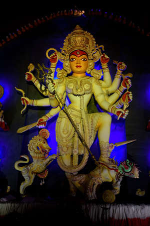 Goddess Durga idol decorated at puja pandal in Kolkata, West Bengal, India. Durga Puja is biggest religious festival of Hinduism and is now celebrated worldwide.のeditorial素材