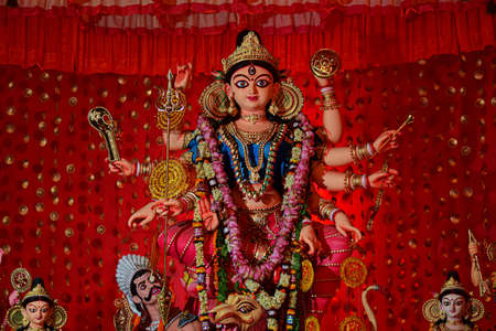 Goddess Durga idol decorated at puja pandal in Kolkata, West Bengal, India. Durga Puja is biggest religious festival of Hinduism and is now celebrated worldwide.のeditorial素材