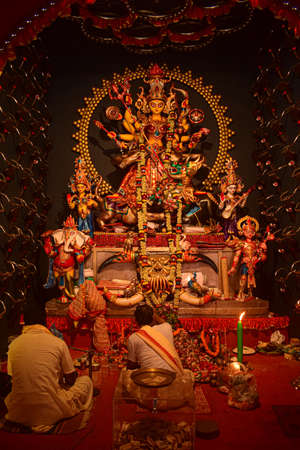 Goddess Durga idol decorated at puja pandal in Kolkata, West Bengal, India. Durga Puja is biggest religious festival of Hinduism and is now celebrated worldwide.のeditorial素材