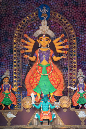 Goddess Durga idol decorated at puja pandal in Kolkata, West Bengal, India. Durga Puja is biggest religious festival of Hinduism and is now celebrated worldwide.のeditorial素材