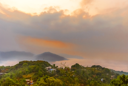 Vibrant color cloudy sky and mountain of a hill station near Sarangkot, Pokhara, Nepal Near Kathmandu.の写真素材