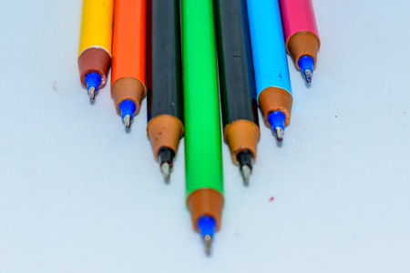 Set of multi-colored pens, tools for writing drawing, isolated on white.の写真素材