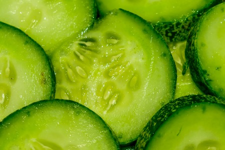 Cucumber and sliced background.の写真素材