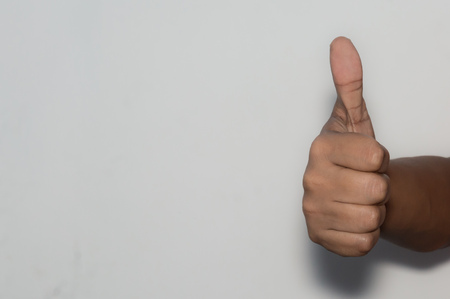 Asian Caucasian business man woman corporate employee showing thumps up, isolated white background. Approval, agree, like, positive approve, win-winner, happy concept.の写真素材
