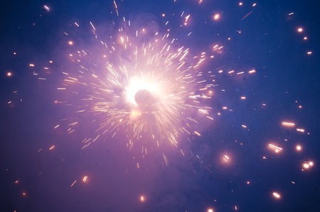 Fireworks Holiday firework in night. Firecracker sparks. Happy new year decoration isolated. Explosion firecracker, holiday celebration. Christmas sparklers on isolated black background. Copy space.の写真素材