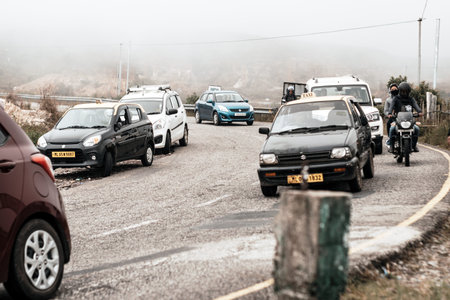 Pelling, Sikkim, India May 16 2018: Tourist vehicles lined up to climb in the step hill region of...