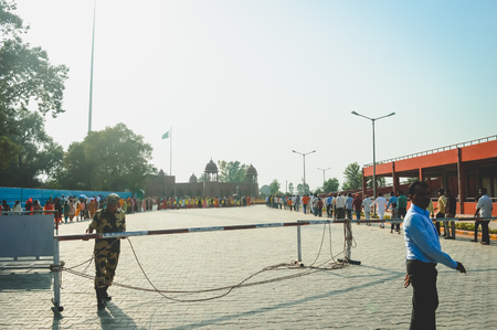 WAGHA BORDER, AMRITSAR, PUNJAB, INDIA - JUNE, 2017. People going to attend lowering of flags ceremony. Its a daily military practice security forces of India and Pakistan jointly followed since 1959.のeditorial素材