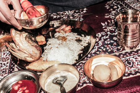 A traditional first solid feeding thali dish ofの写真素材