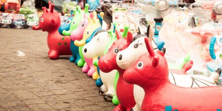 Handmade plastic toys for display in christmas celebration in New Bagri Market Kolkata India. Playful design of decorative element. Selective focus with shallow depth of field.の写真素材