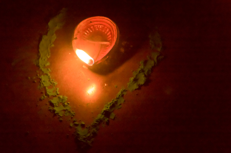 Diya- Oil Lamp lit in festival season of Diwali on black background. Concept of removing darkness.の写真素材