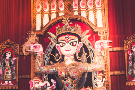 Potrait Of Goddess Durga idol at a South Kolkata famous Durga puja temple (pandal) on "Maha Ashtami"のeditorial素材