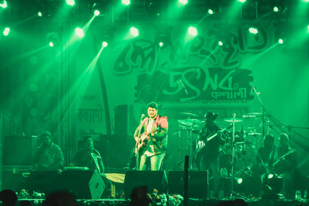 Kolkata India 1 May 2019 - Guitarist performing rock concert venue with lit bright colorful stage...